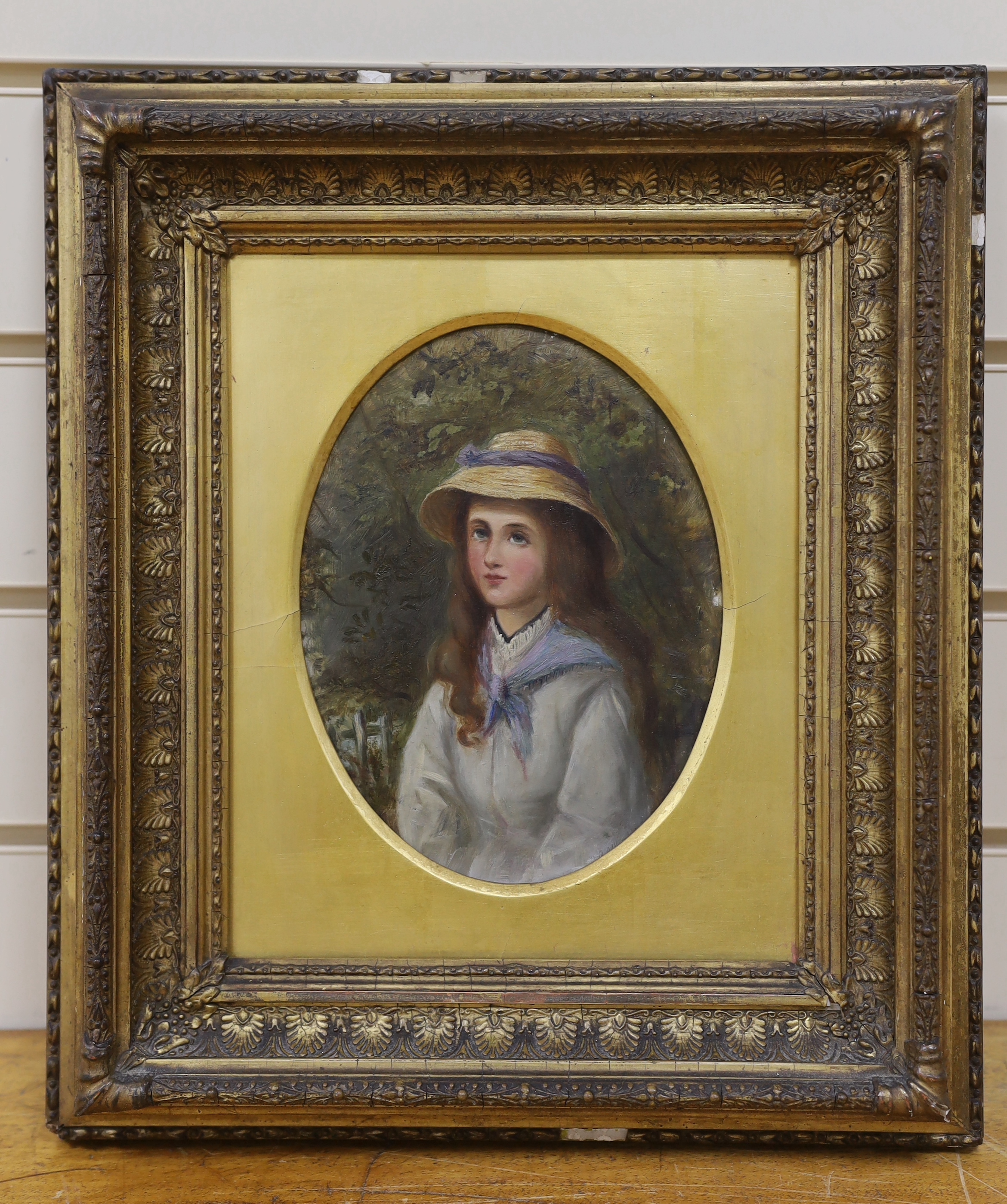 Early 20th century English School, oil on board, Half length portrait of a young lady wearing a bonnet, indistinctly signed, oval, 20 x 15cm, ornate gilt frame